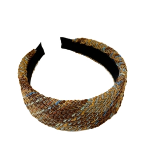 Wide knit headband with luxury tweed texture in orange and blue weave colors