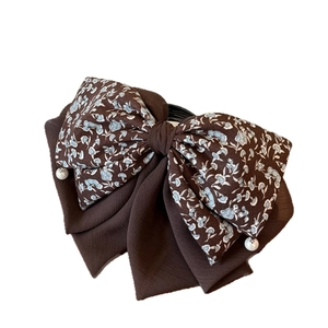 Elegant floral bow hair clip with pearls for french style ponytail hair styling
