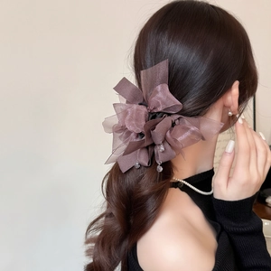 Elegant purple organza bow hair tie with crystal pendant for high-end ponytail styling