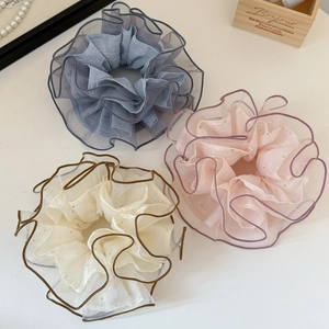 Three elegant organza hair scrunchies with sequins in blue, purple and ivory colors