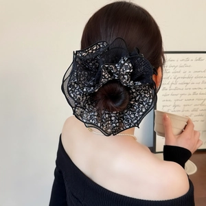 Floral mesh scrunchie in black and white print for elegant ponytail hairstyles