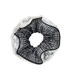 Plaid scrunchie with white lace trim, black and white checkered hair accessory for women