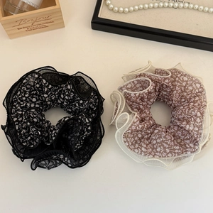Floral print mesh scrunchies with elegant lace trim in black and pink for women