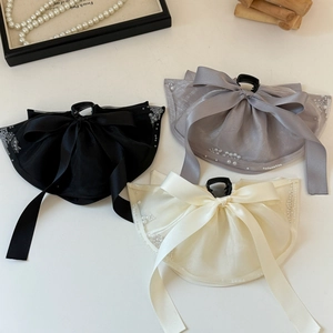 Elegant bow hair clips with pearls and ribbons in black, grey, and cream colors