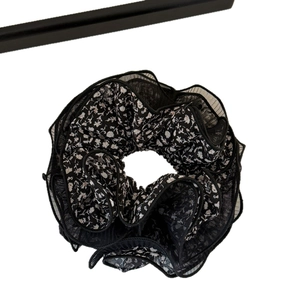 Floral mesh scrunchie in black organza with delicate pink flowers for women's hair