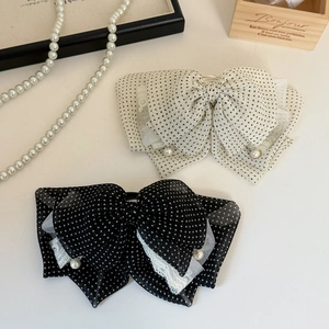 Polka dot mesh bow hair clips with pearls and lace detail in black and white colors