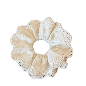 Elegant cream white lace scrunchie with layered fabric and delicate scallop edges