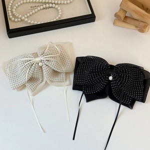 Pince à cheveux vintage française avec nœud à pois et perles en crème et noir