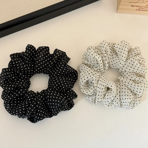 Set di elastici per capelli a pois in rete neri e bianchi per uno styling elegante