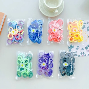 Colorful high elasticity hair ties set in daisy patterned frosted zipper pouches