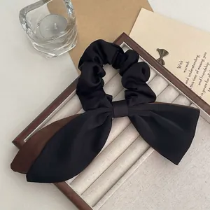 Dual-layer oversized satin bow scrunchie with ribbons for women elegant hair accessory