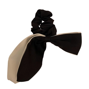 Elegant double-layered black and white bow hair scrunchie made of silky chiffon fabric