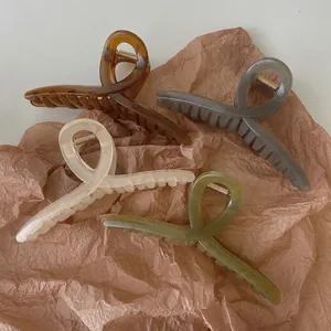 Set of 4 large matte hair claws in amber, grey, cream, and olive green resin finish