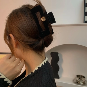 Elegant black velvet camellia hair claw clip for women in vintage French style