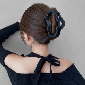 Minimalist large matte black irregular hair claw clip for elegant updo hairstyles