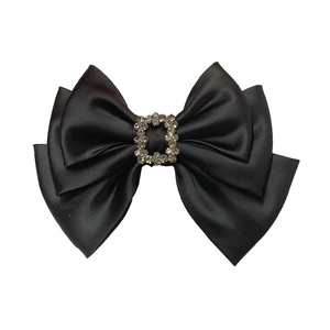 Elegant black satin bow hair clip with a luxury rectangular rhinestone buckle on white background