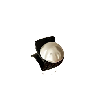 French vintage small pearl hair claw clip with elegant black and white aesthetic