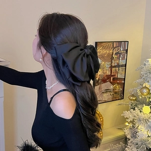 Elegante fermaglio per capelli a fiocco nero in raso con finitura setosa da donna