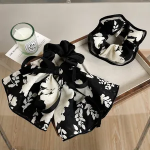 Floral print oversized scrunchie and bow set in black and white chiffon fabric