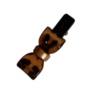 French leopard pattern bow hair clip with tortoiseshell finish and metal duckbill clip