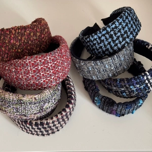 Chic padded tweed headbands in various colors for an elegant vintage winter hairstyle