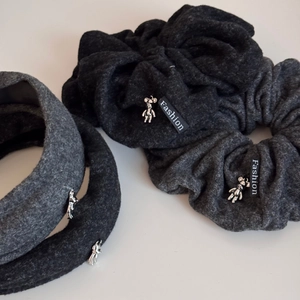Dark grey velvet padded headband with metallic bear charm and fashion fabric label