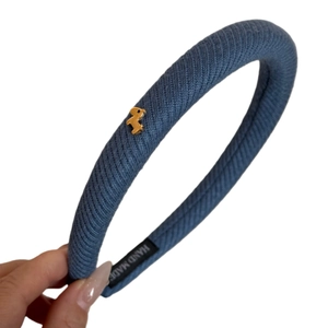 Cerchietto in maglia twill blu navy con ciondolo a forma di cane dorato per donna