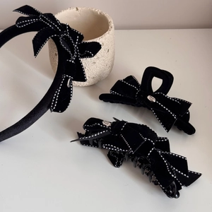 Three-piece black velvet hair accessory set with polka dot bows and handmade metal tags