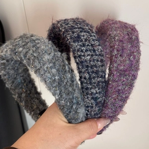 Three-piece set of knitted plush headbands in grey, navy blue, and pink for women