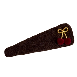 Brown felt cherry hair clip with golden bow and red pom-poms for autumn winter style