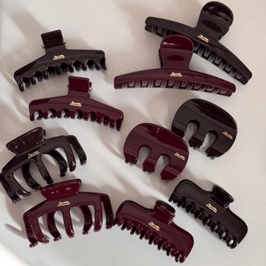 Elegant burgundy hair claw clips set with gold lettering for women's hair styling