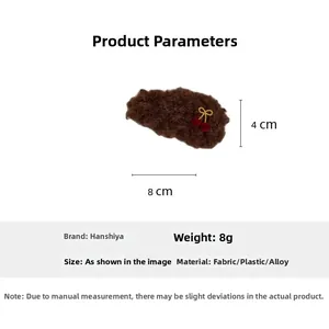 Detailed view of brown plush hair clip with cherry bow embroidery and dimensions 8x4cm