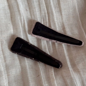 Detailed back view of wool fabric BB hair clips showing metal snap and felt backing