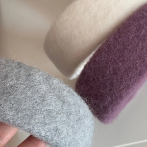Elegant wool-like plush wide headbands in grey, beige, and purple for luxury hair styling