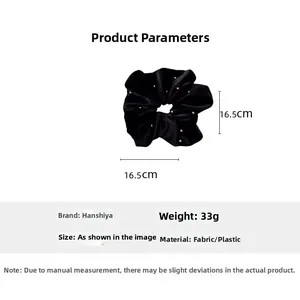 Detail of black velvet scrunchie with pearls, size 16.5cm and 33g product parameters