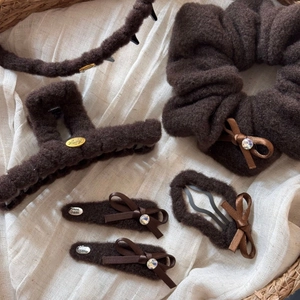 6-piece brown plush hair accessory set with Lucky metal charms and satin bows