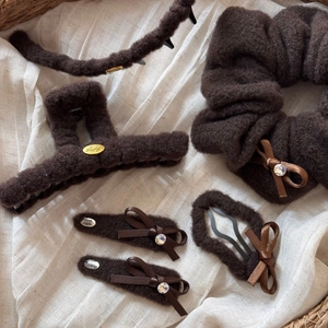 Brown winter plush hair accessory set with fuzzy claw clip, scrunchie and headband