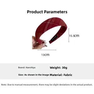 Detailed view of red plaid headband with dimensions 15.5cm by 13cm and weight 30g