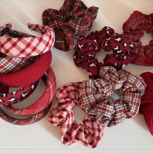 Set of thick red headbands and hair scrunchies with plaid and leopard patterns