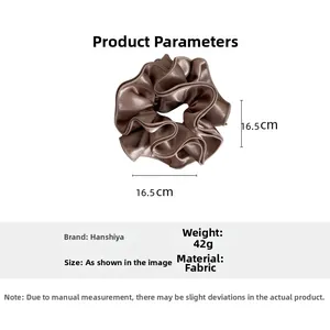 Detail view of large brown satin scrunchie with 16.5cm diameter and 42g weight specifications