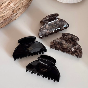 Elegant set of four retro fan-shaped acetate hair claws in black and tortoiseshell finish