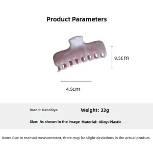 Detailed size view of pink marble ink hair claw clip with 9.5cm length measurements