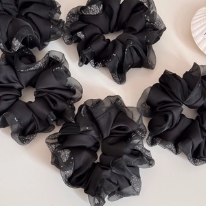 Elegant black satin hair scrunchies with sequined mesh trim and ruffled edges for women