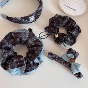 Detailed set of blue tweed hair accessories with headbands and scrunchies for women