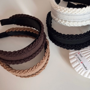 Set of four cable knit twisted headbands in dark brown beige white and black colors