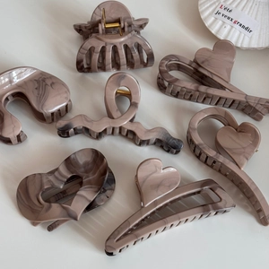 Khaki marble ink pattern large hair claw clips in various elegant geometric shapes