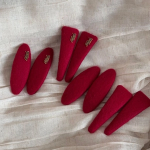 Elegant red wool felt hair clips set with handmade gold metal tags for women