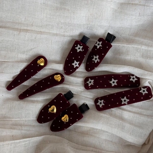 Burgundy velvet hair clip set with gold heart and silver star charms for elegant styling