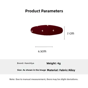 Detailed view of burgundy red fabric heart print hair clip with 6.5cm length dimensions