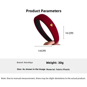 Detail view of burgundy velvet headband with heart ornament and product dimensions